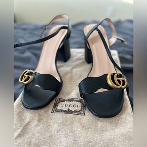 Double G gold-toned mid-heel leather sandals.